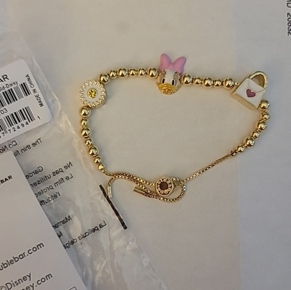 BaubleBar Jewelry - BaubleBar X Disney Daisy Charm Bracelet NEW
